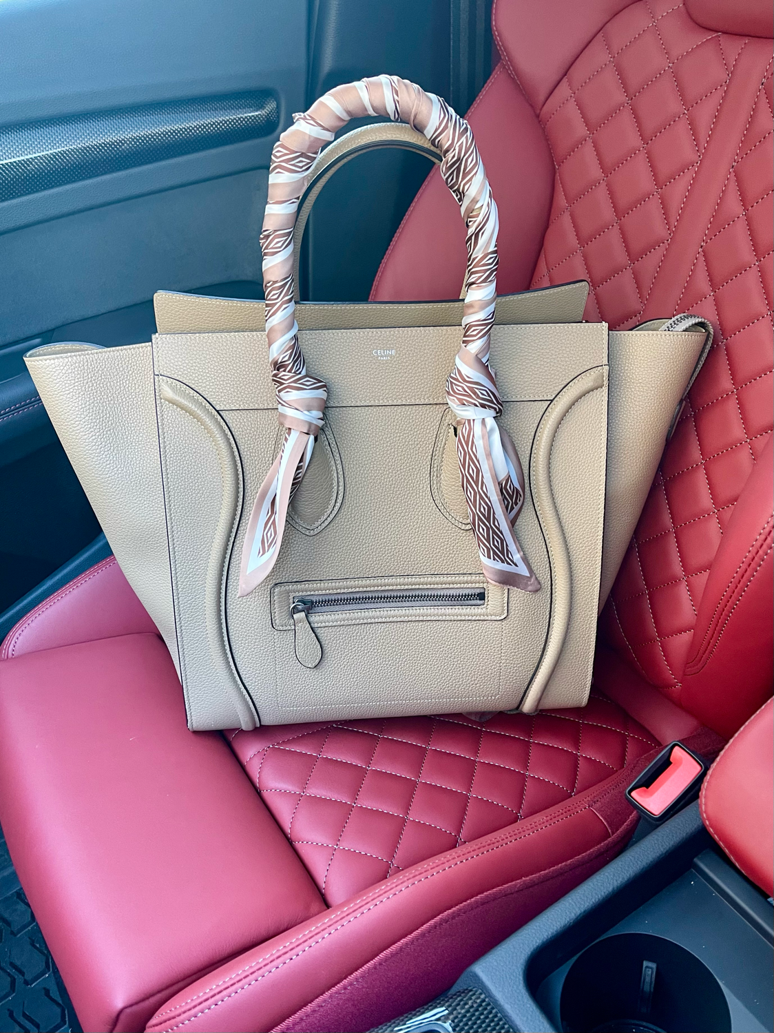 A black and cream polyester scarf for Formula 1 fans from The Paddock Collection