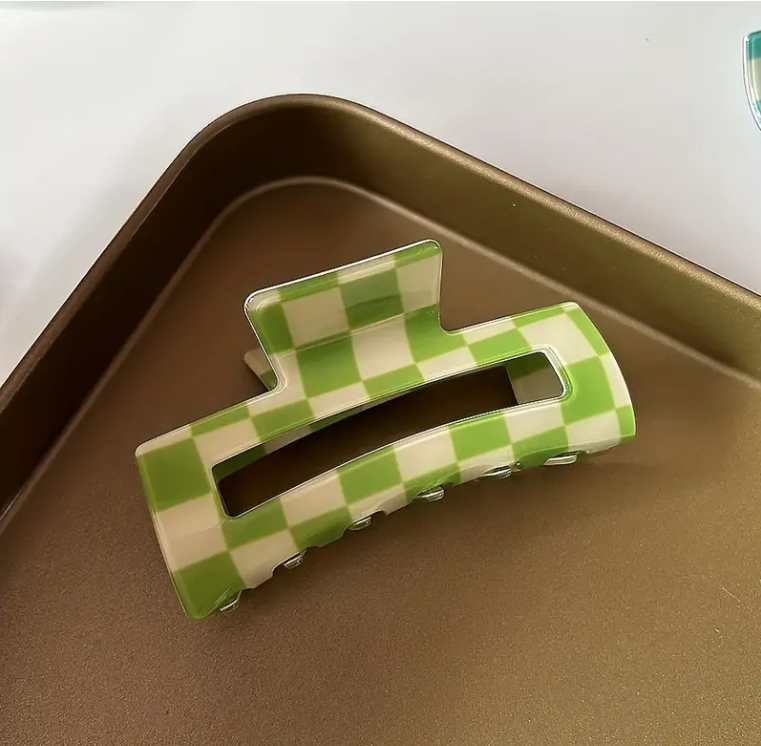 A green and white checkered claw clip for Formula 1 fans from The Paddock Collection