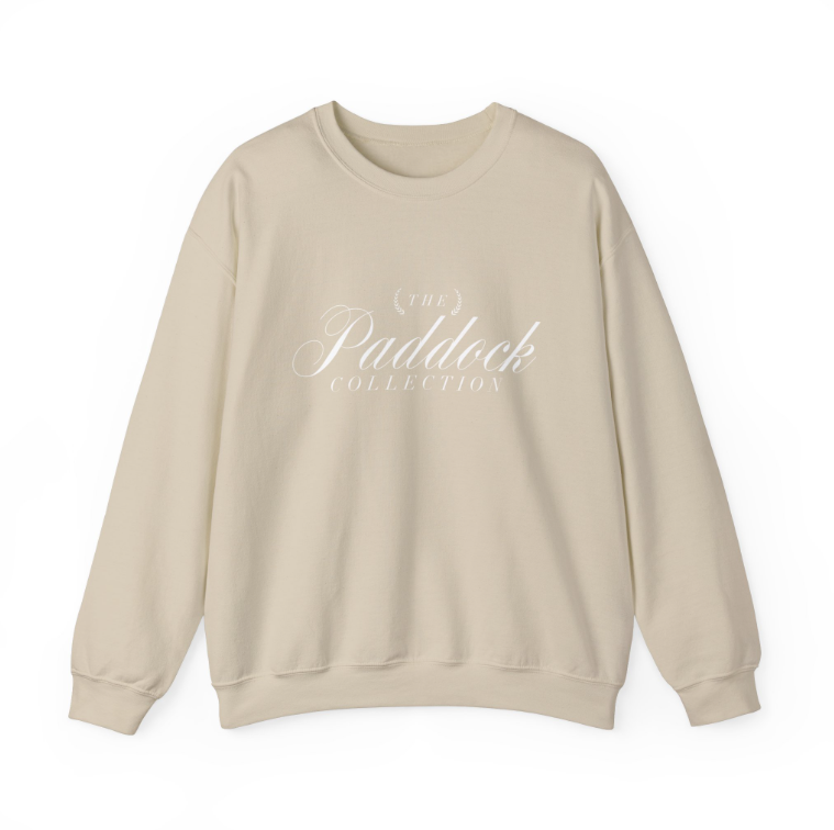 A beige Formula 1 crewneck sweater with white embroidery The Paddock Collection for F1 fans