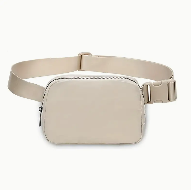 A beige belt bag for The Formula 1 Paddock Cub by The Paddock Collection