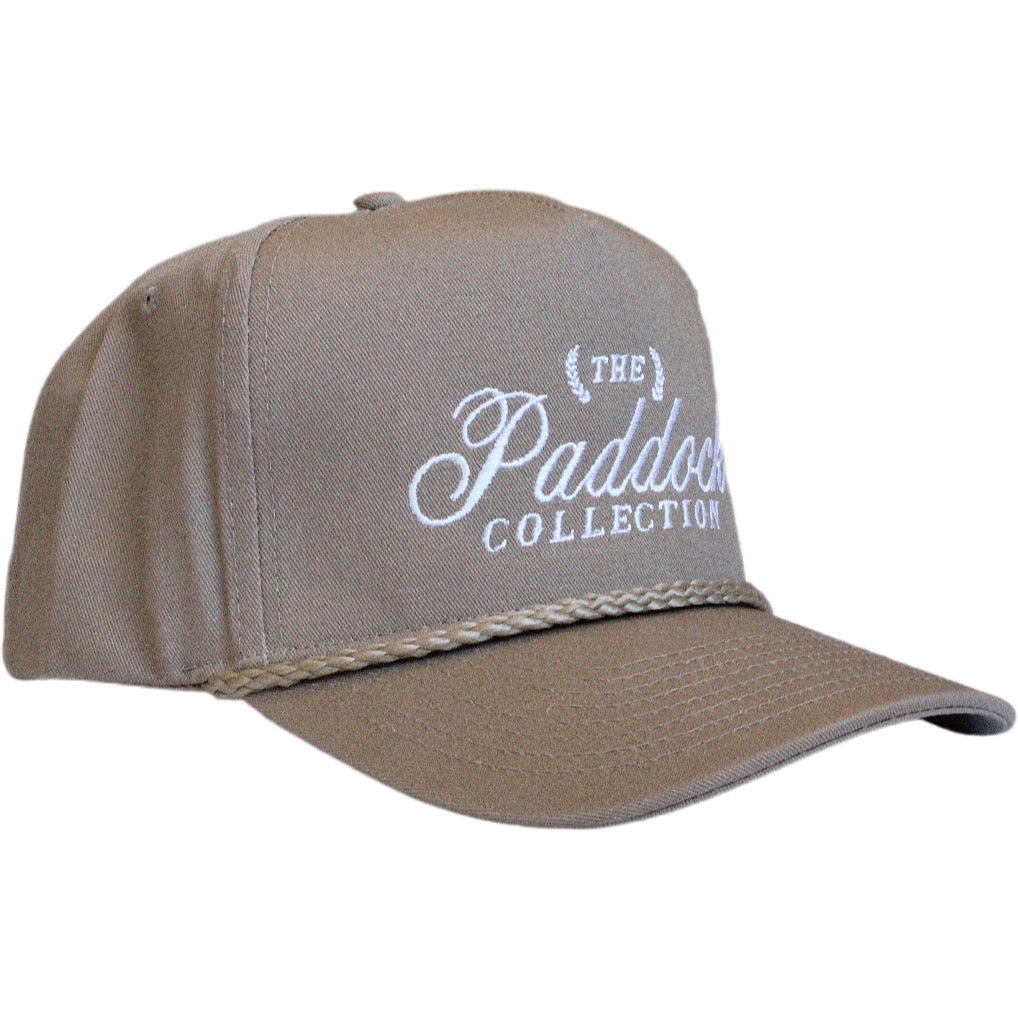 A beige hat with rope detail and white embroidery The Paddock Collection for Formula 1 fans