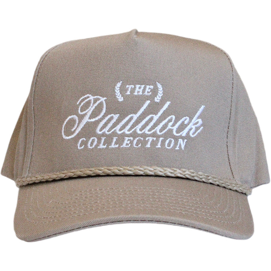 A beige hat with rope detail and white embroidery The Paddock Collection for Formula 1 fans